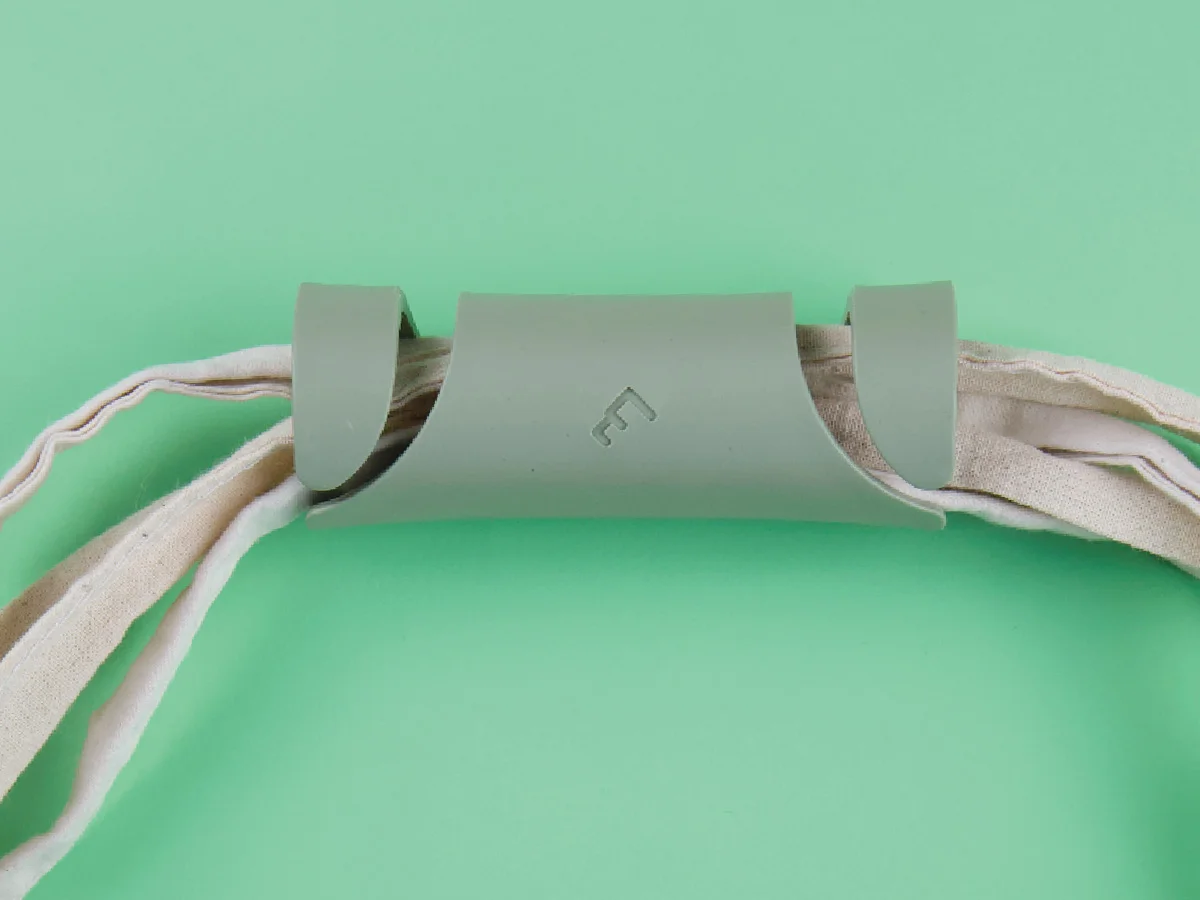 Carryfix portable handle designed by Formeta Design for carrying heavy bags and gloceries
