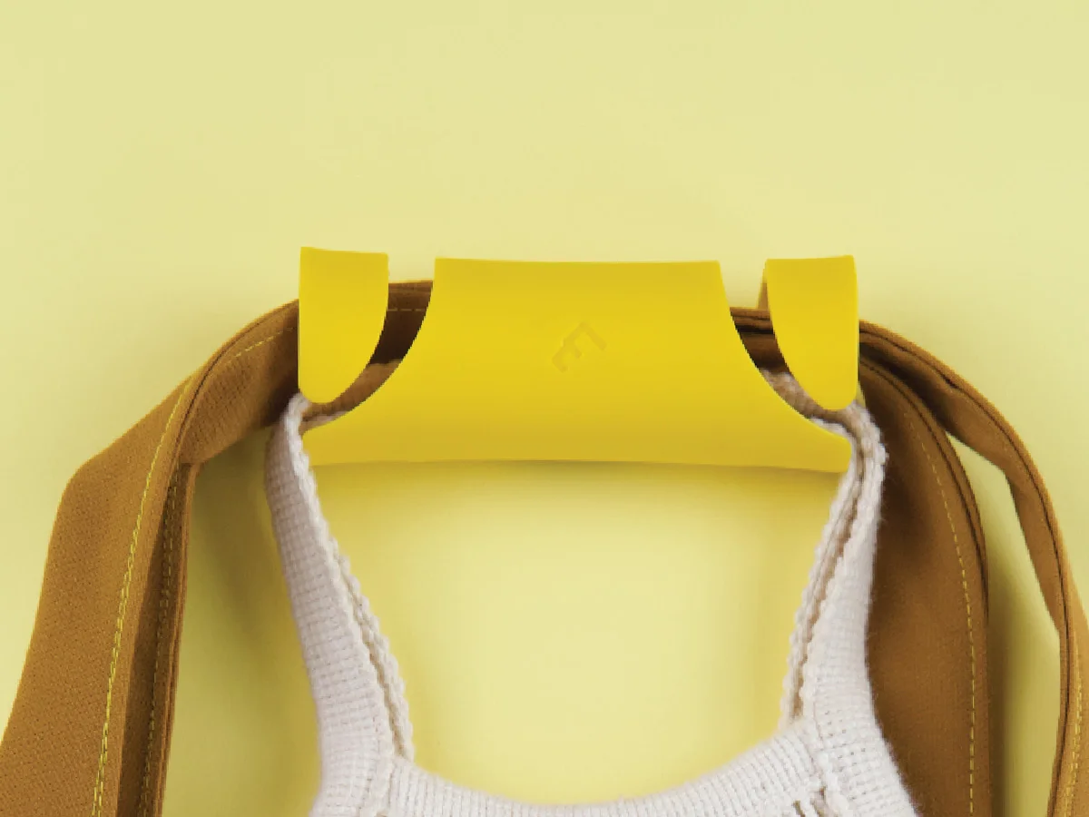 Carryfix portable handle designed by Formeta Design for carrying heavy bags and gloceries